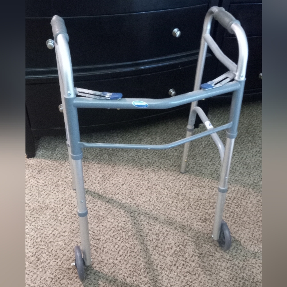 Rolling walker lightweight aluminum, folding, and adjustable.Only $15 firm